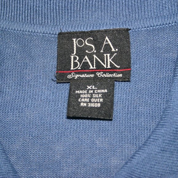 This is a Jos A Bank Blue 100% Silk Polo. It is an XL and feels amazing on. - Picture 2 of 3